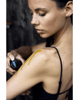 A decadent whole body oil made with essential oils for all-over use.